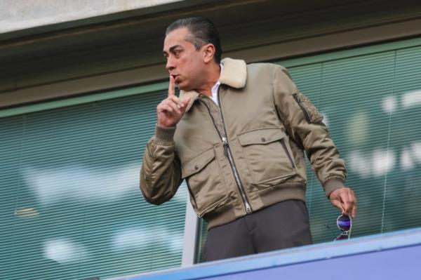 Behdad Eghbali is pictured putting his finger to his lips after Chelsea scored against Brighton